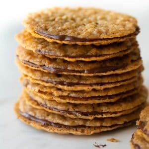 stack of lace cookies on marble slab