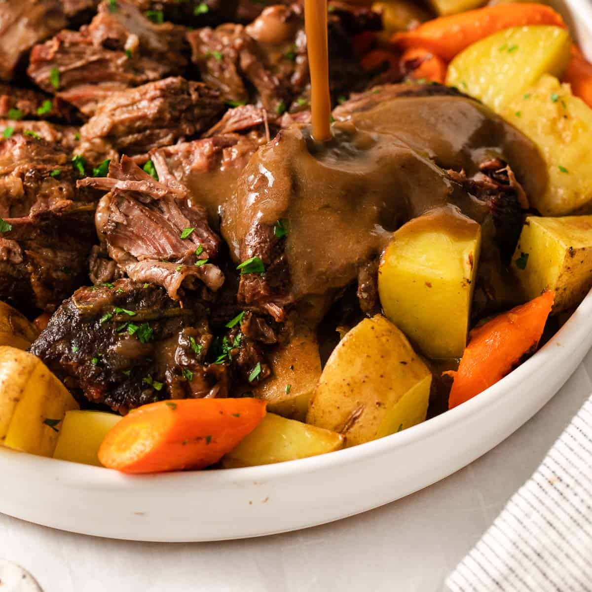Slow Cooker Red Wine Pot Roast - Sweet and Savory Meals