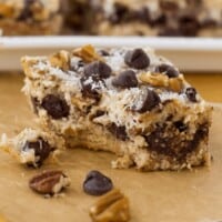 Sideview of cookie bar with a bite taken from it