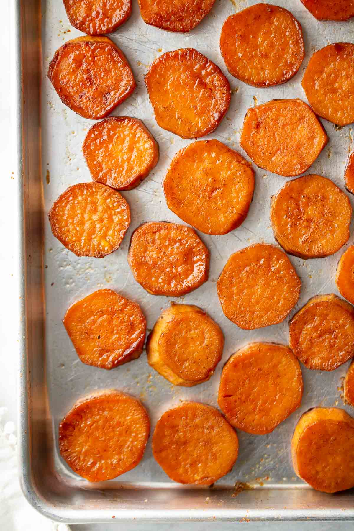 roasted sweet potatoes cut in circles on pan