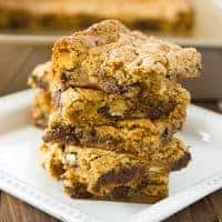 close up shot of almond flour blondies on white plate