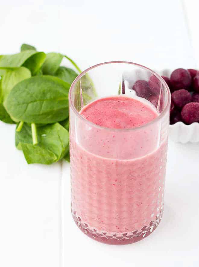 cherry smoothie in glass cup