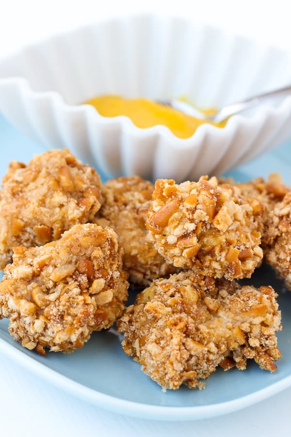 Gluten-Free Pretzel Crusted Chicken Bites! Quick, easy and so delicious you'd never guess they're gluten-free!