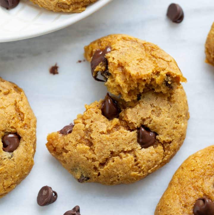gluten-free pumpkin cookie on marble background with chocolate chips