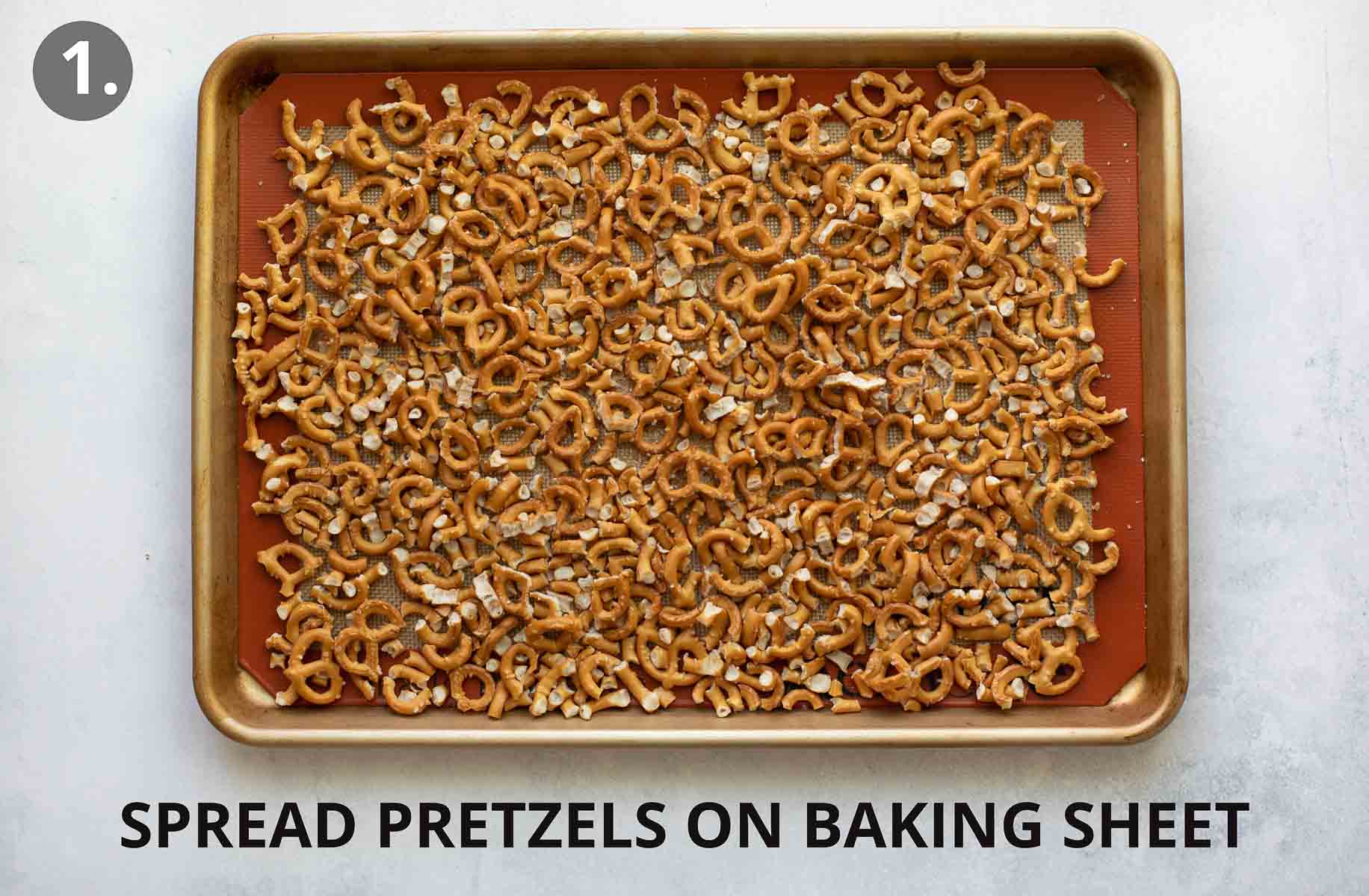 gluten free pretzels spread out on lined baking sheet