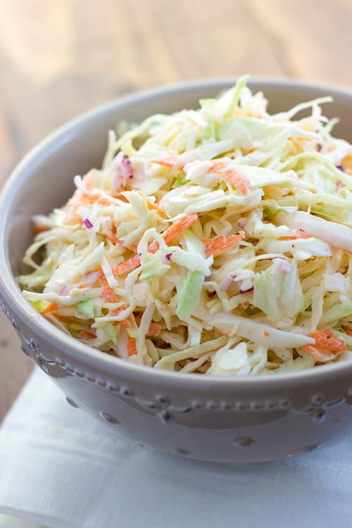 close up shot of coleslaw in gray bowl 