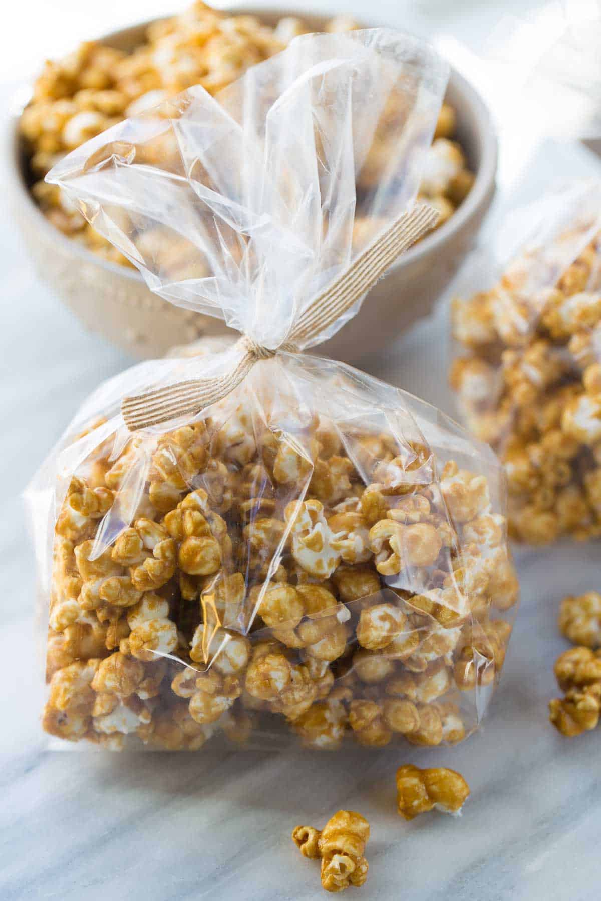 caramel corn in bag with ribbon for holiday gift