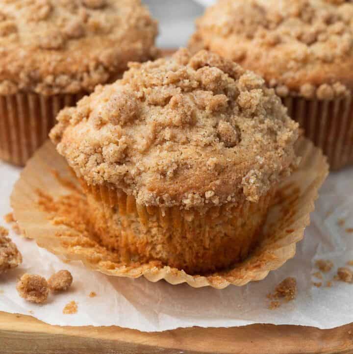 gluten free apple muffins with wrapped peeled sitting on white parchment
