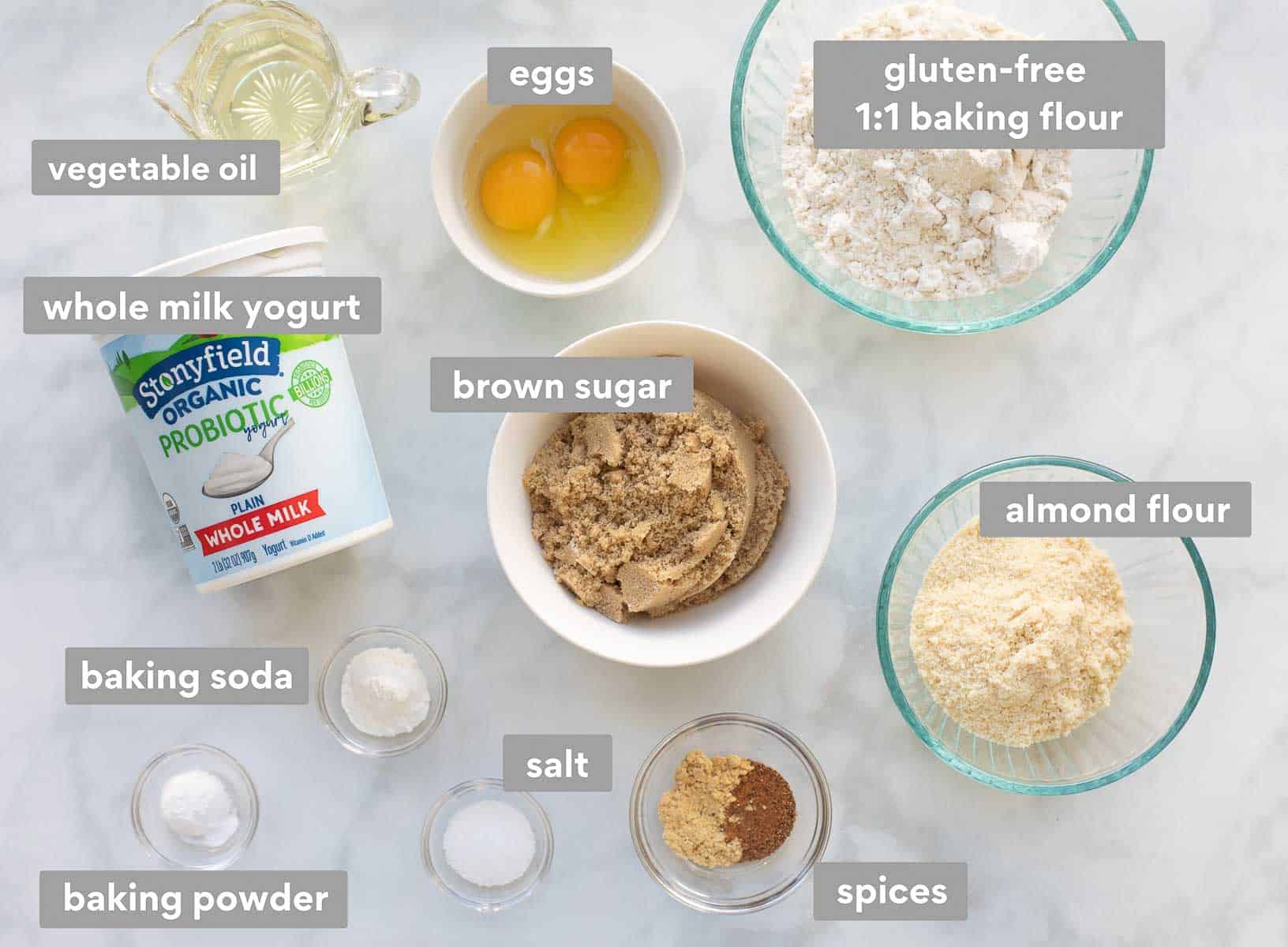 Apple muffin batter ingredients spread on the counter