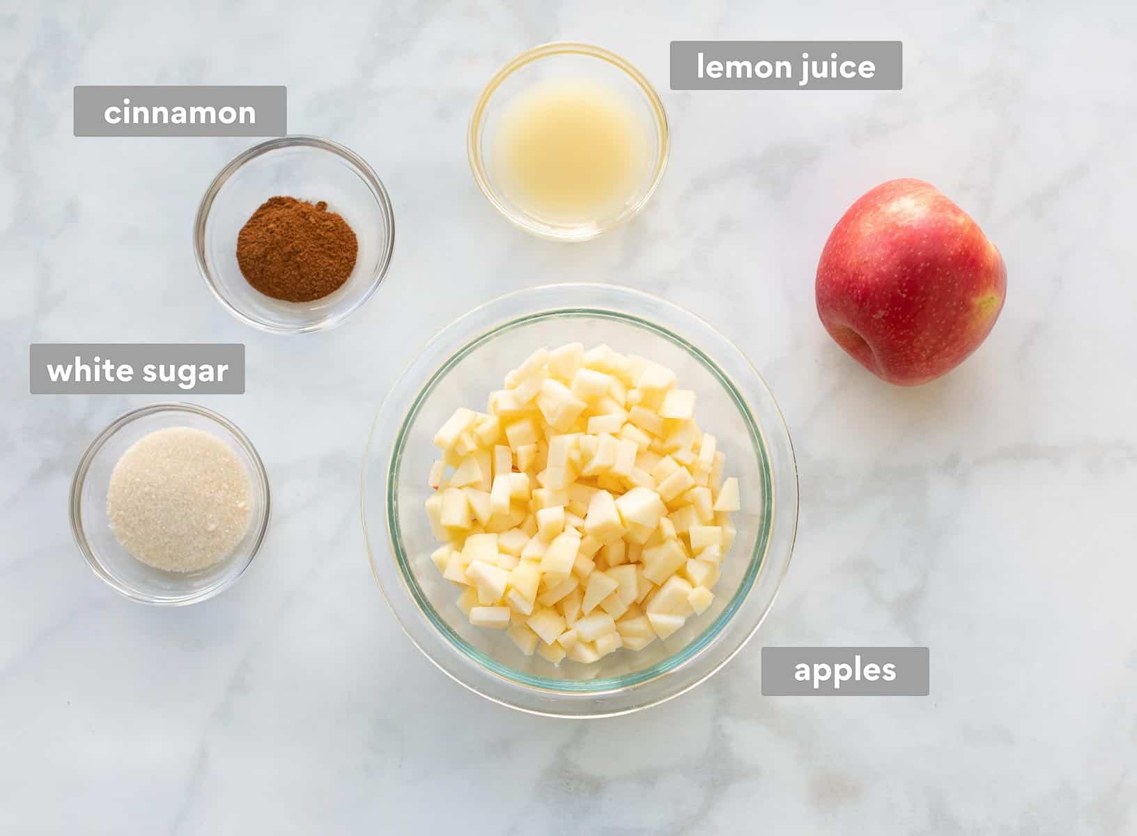 Apple muffin mixture ingredients on the counter