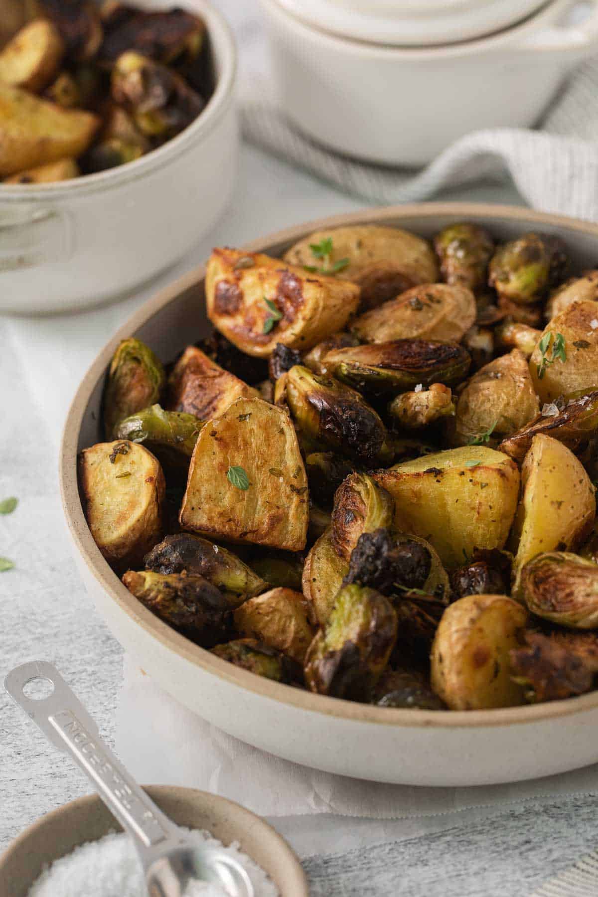 roasted potatoes and brussel sprouts in a bowl