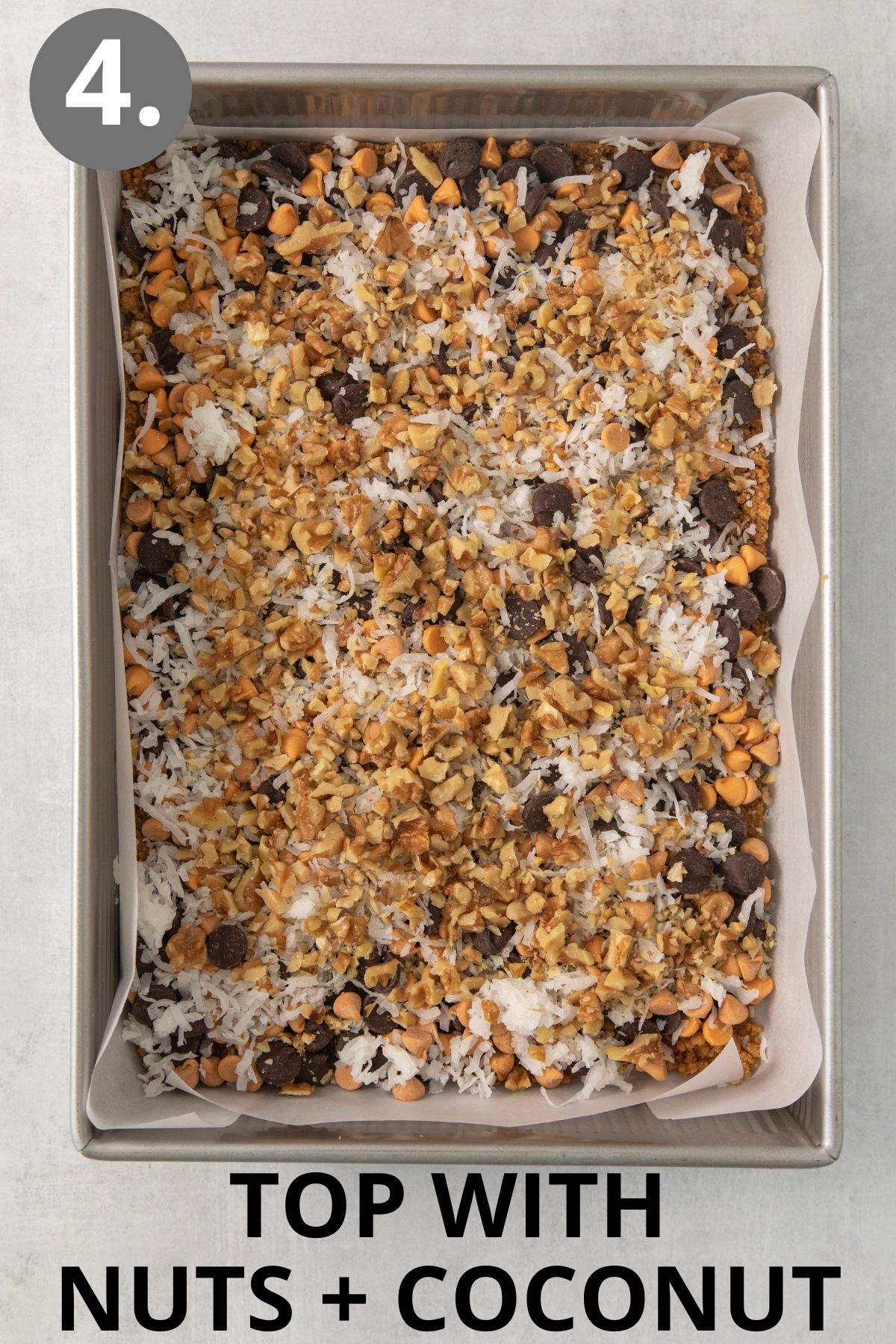 nuts and coconut on top of the 7-layer bars