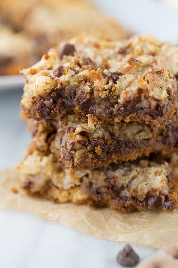 Gluten-Free Salted Caramel 7-Layer Bars! An ooey-gooey decadent treat with a sweet and salty twist. So easy to make!