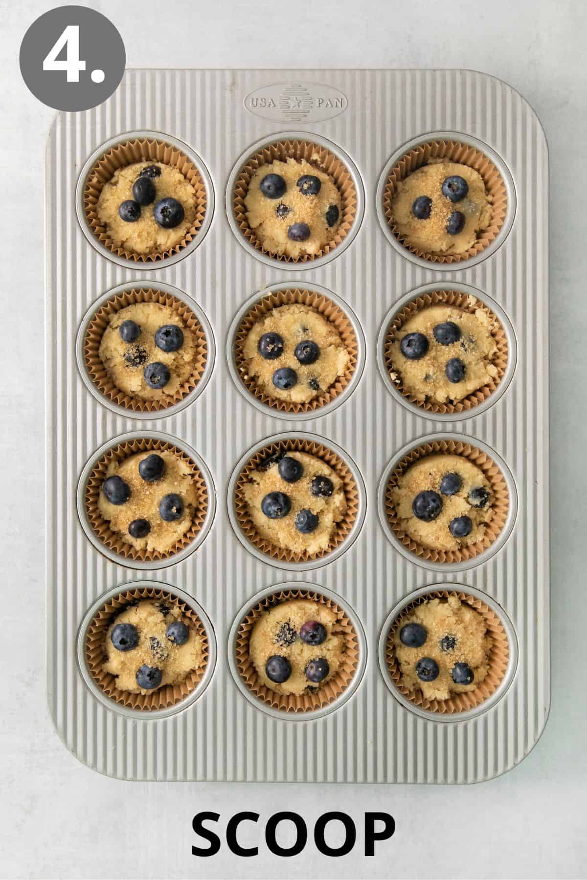 Coconut flour blueberry muffin batter in a muffin tin