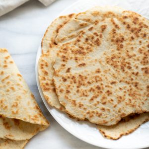 gluten-free flatbread on white plate