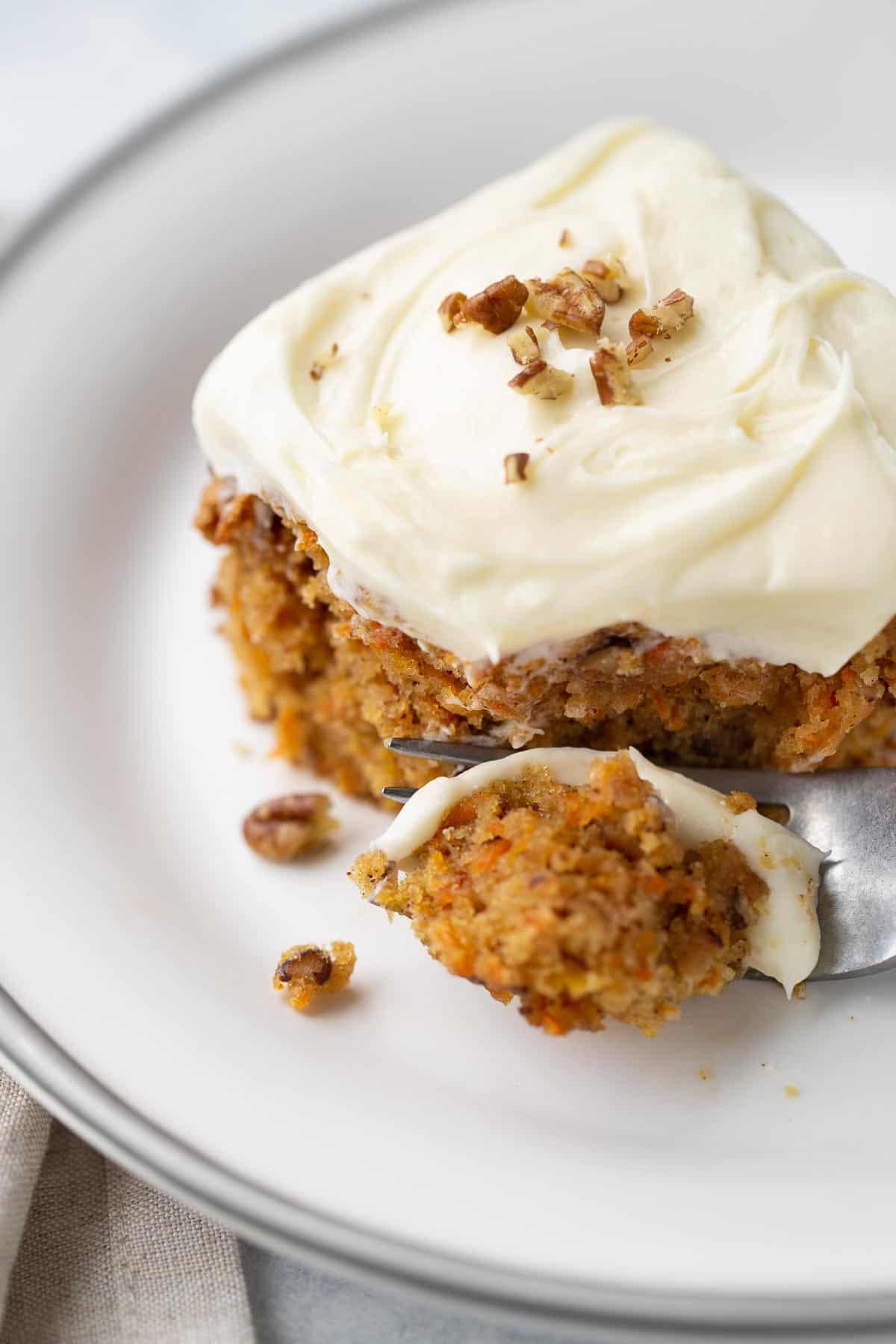 slice of gluten-free carrot cake on a plate
