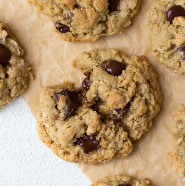 close up shot of cookie broken in half on brown parchment paper