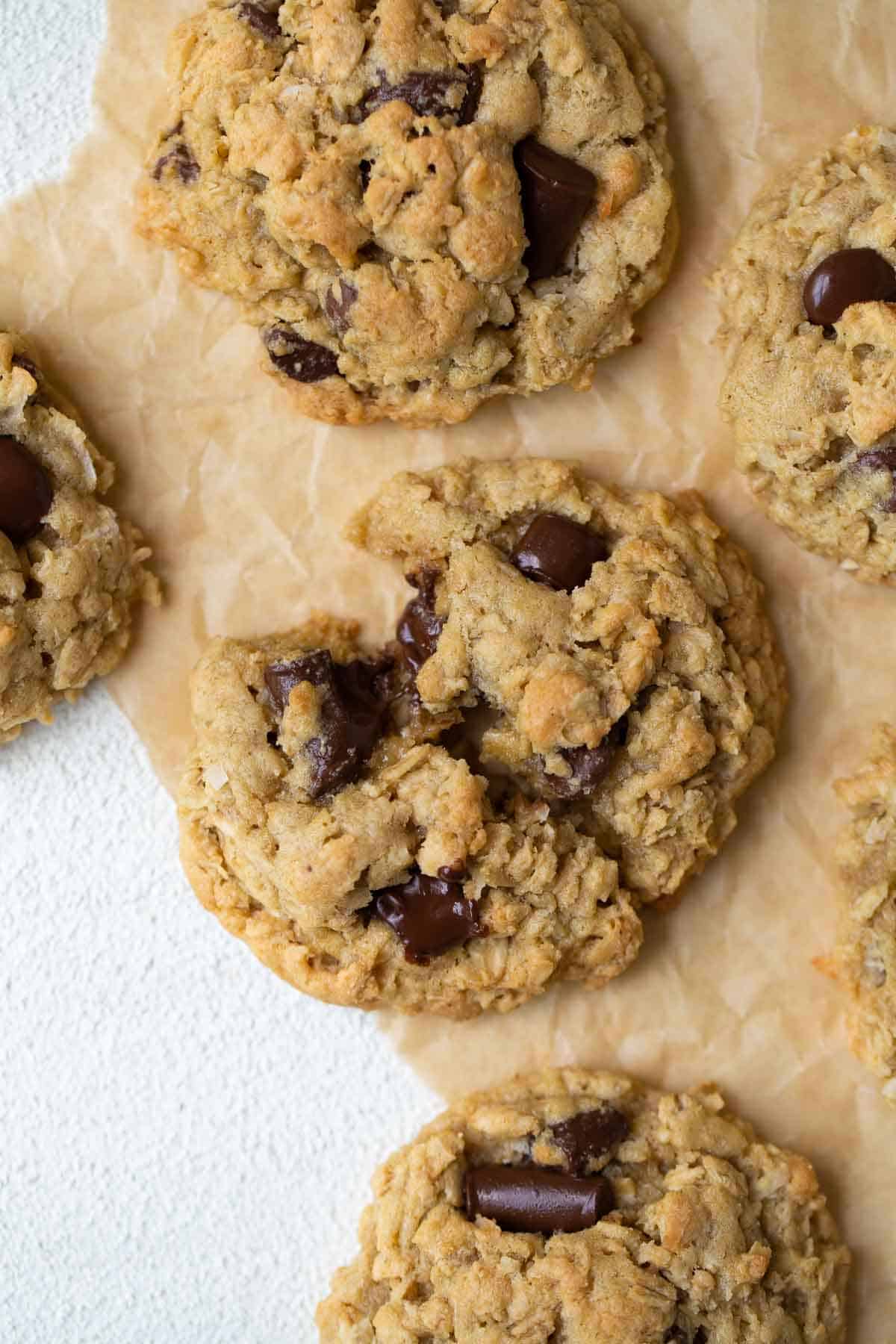 close up shot of cookie broken in half on brown parchment paper