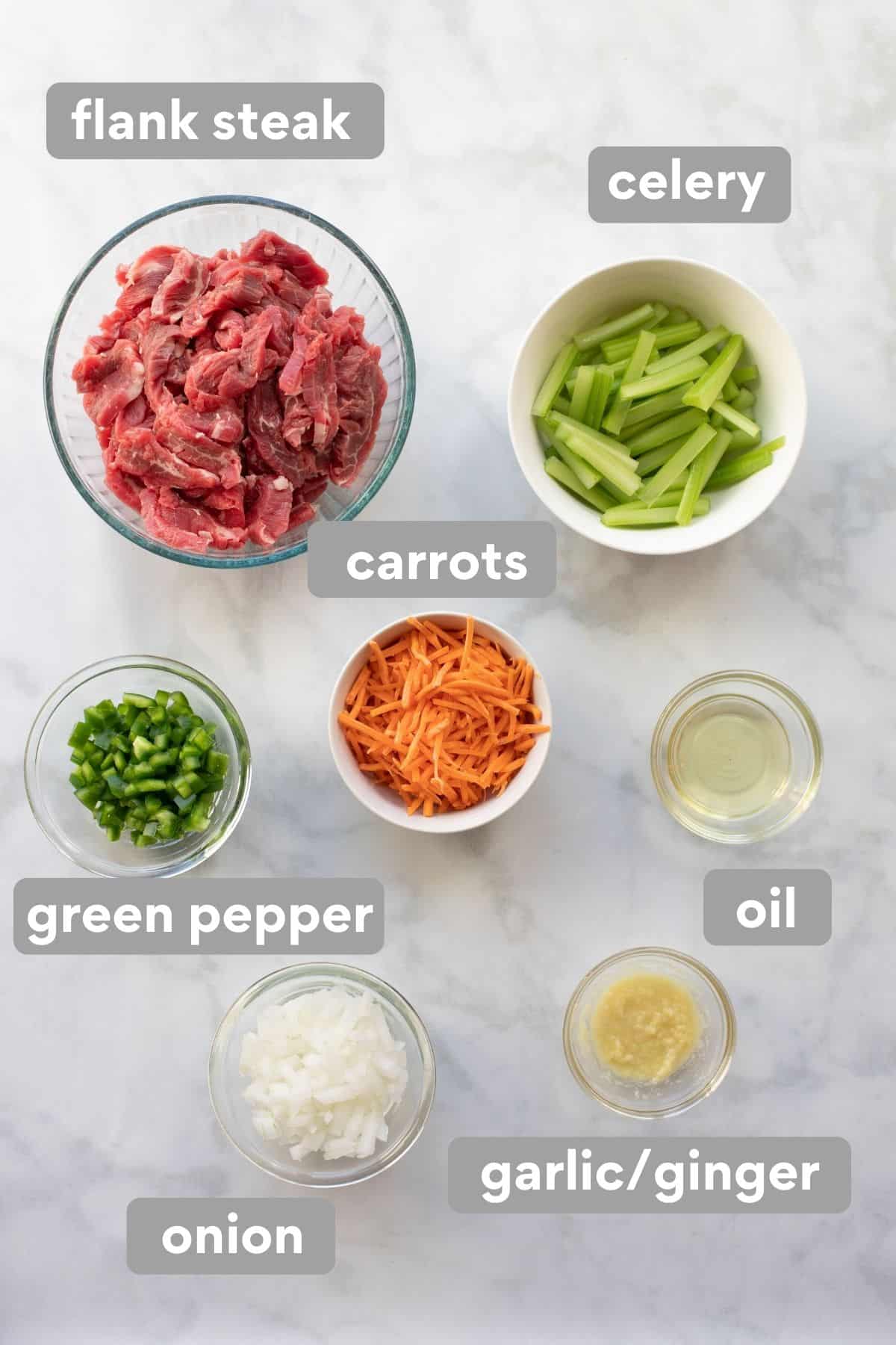 Ingredients for beef stir-fry on a countertop