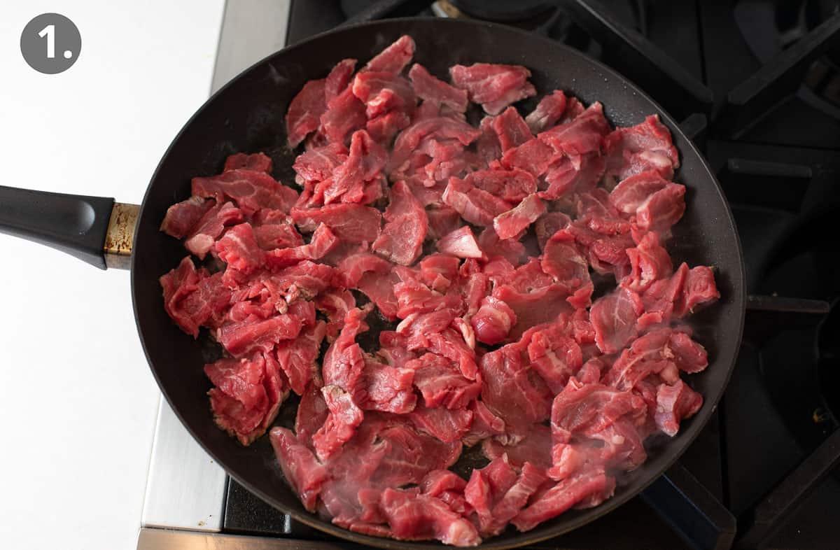 Raw beef in a skillet