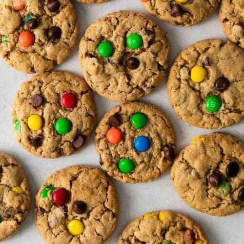 Gluten-free monster cookies on a baking sheet