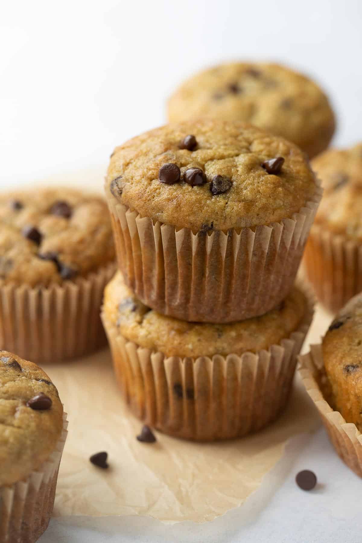 2 gluten-free banana muffins stacked with mini chocolate chips
