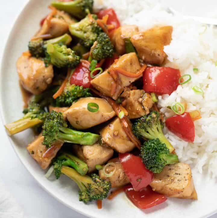 gluten free stir fry on plate with white rice