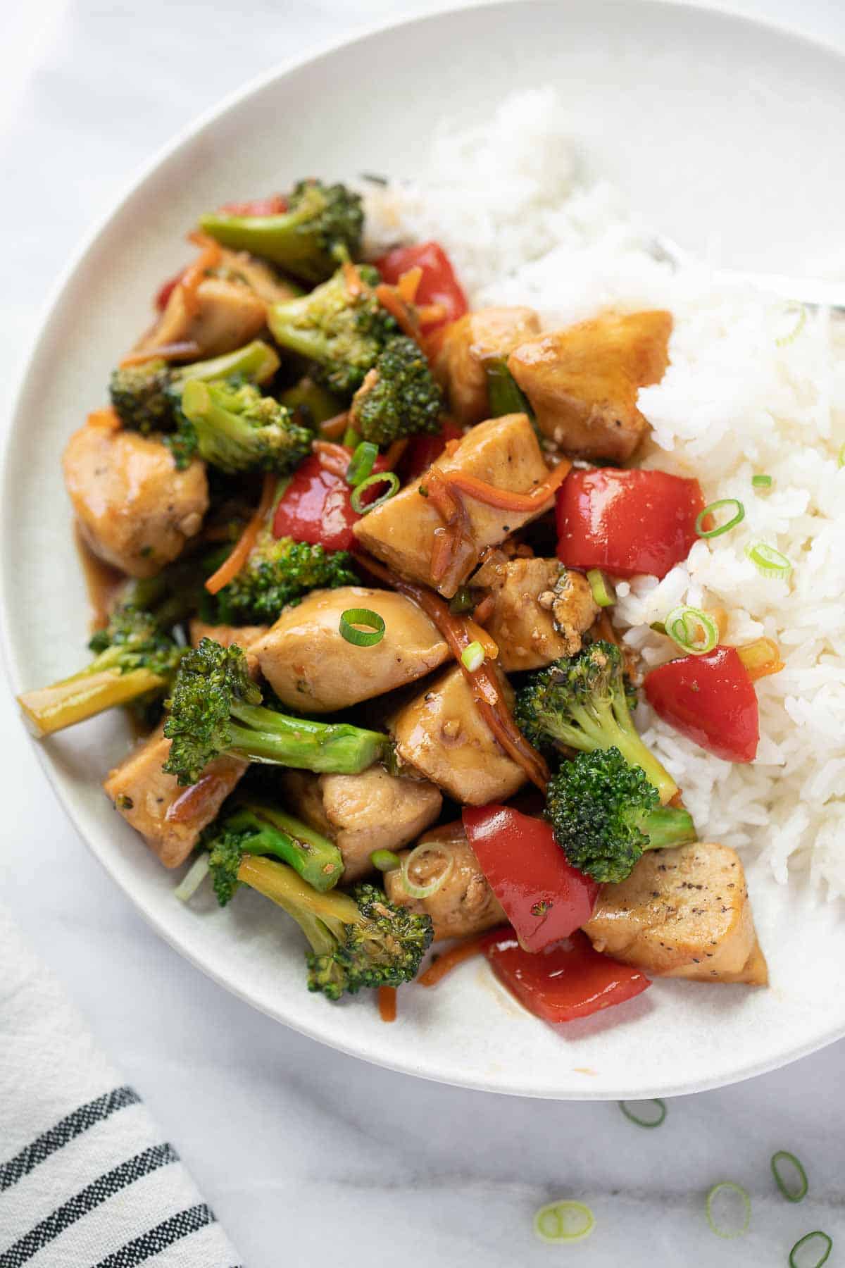 gluten free stir fry on plate with white rice