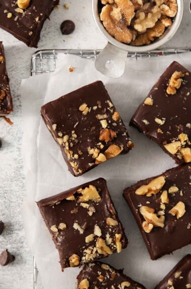 close up of dairy free fudge on parchment paper