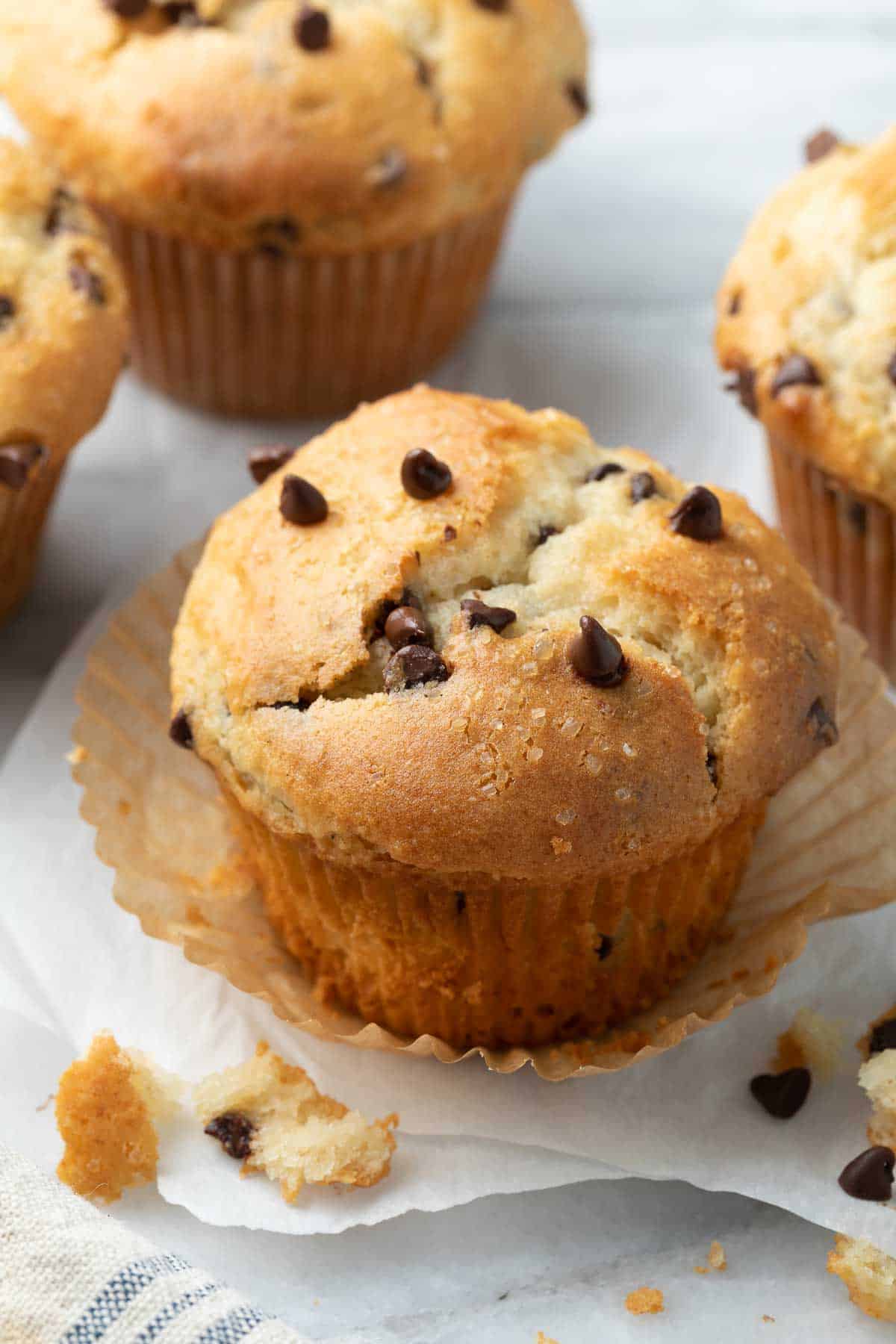 A gluten-free chocolate chip muffin on a counter