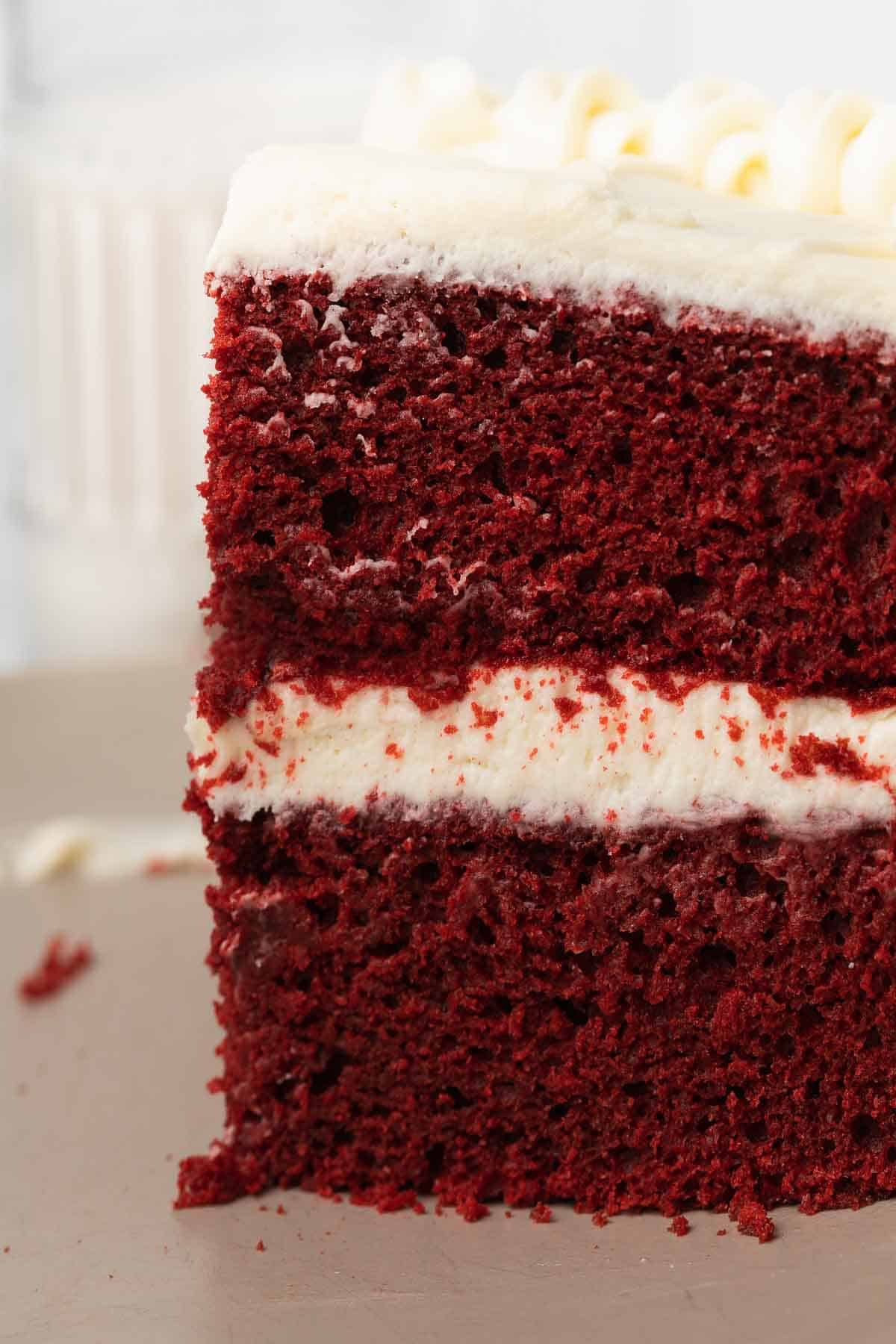 slice of red velvet cake on gray plate