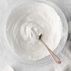 7 minute frosting in a bowl with a spoon