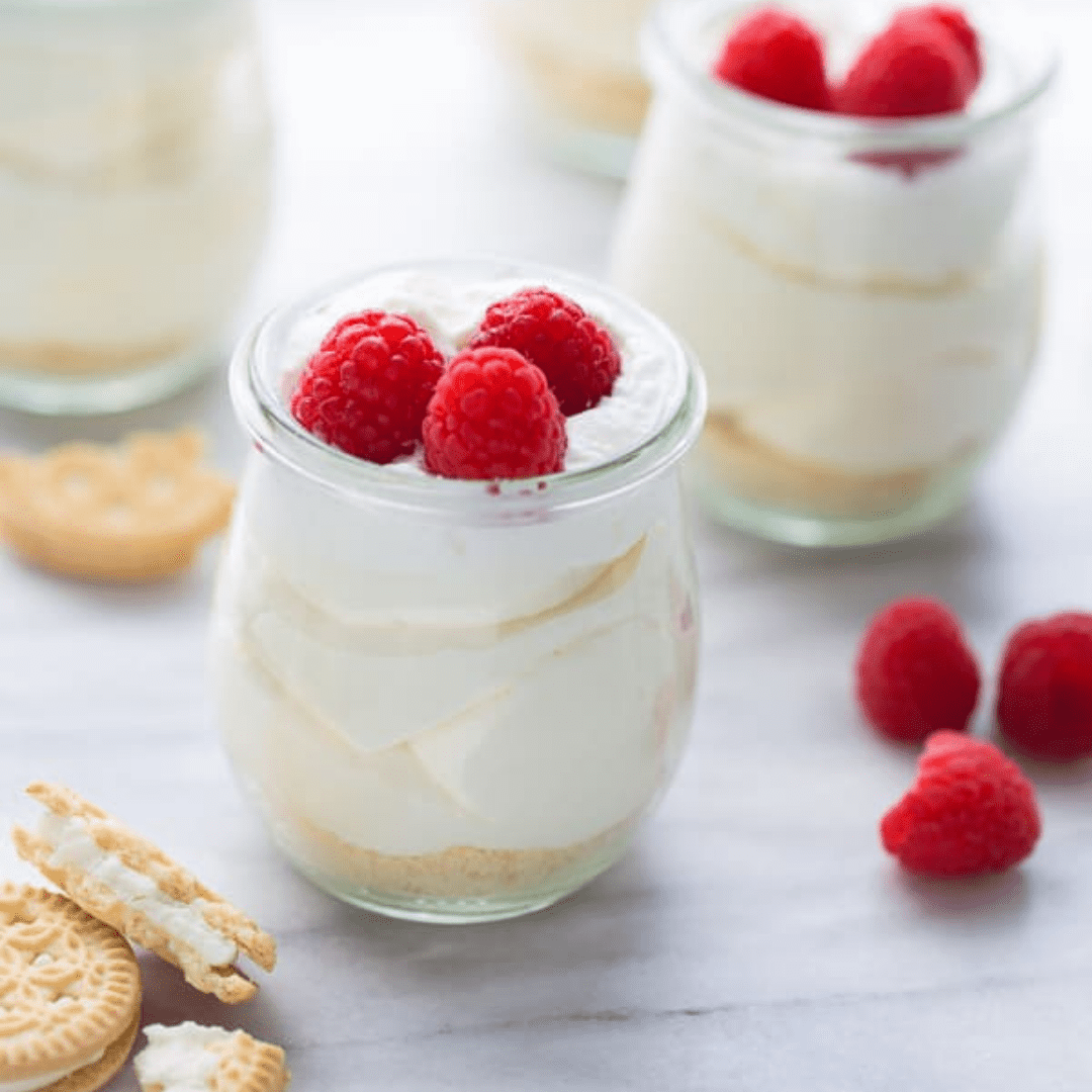 Mini cheesecakes in jars on a counter