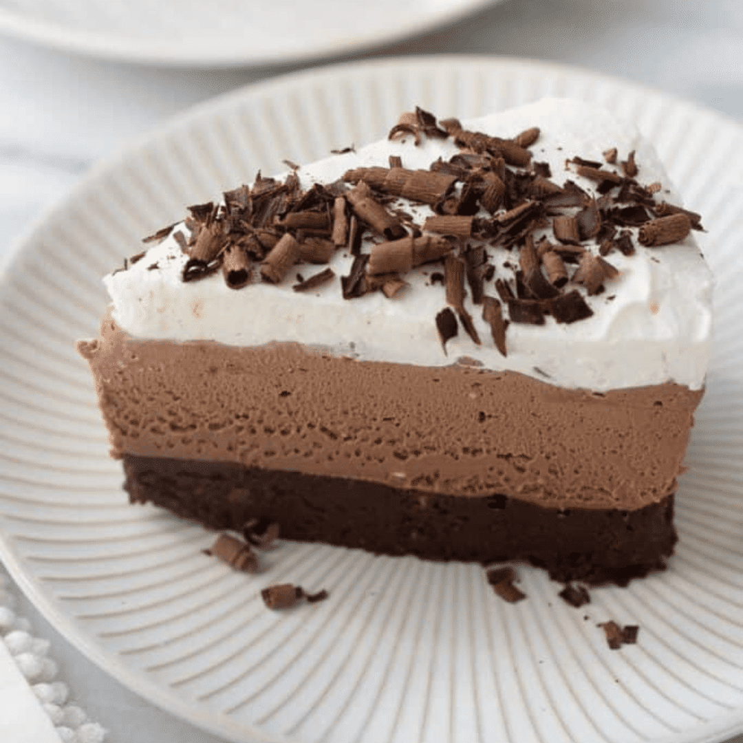 A slice of chocolate mousse pie on a plate