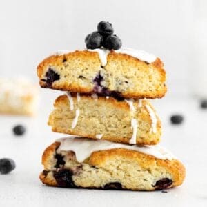 blueberry scones stacked on top of each other on a countertop