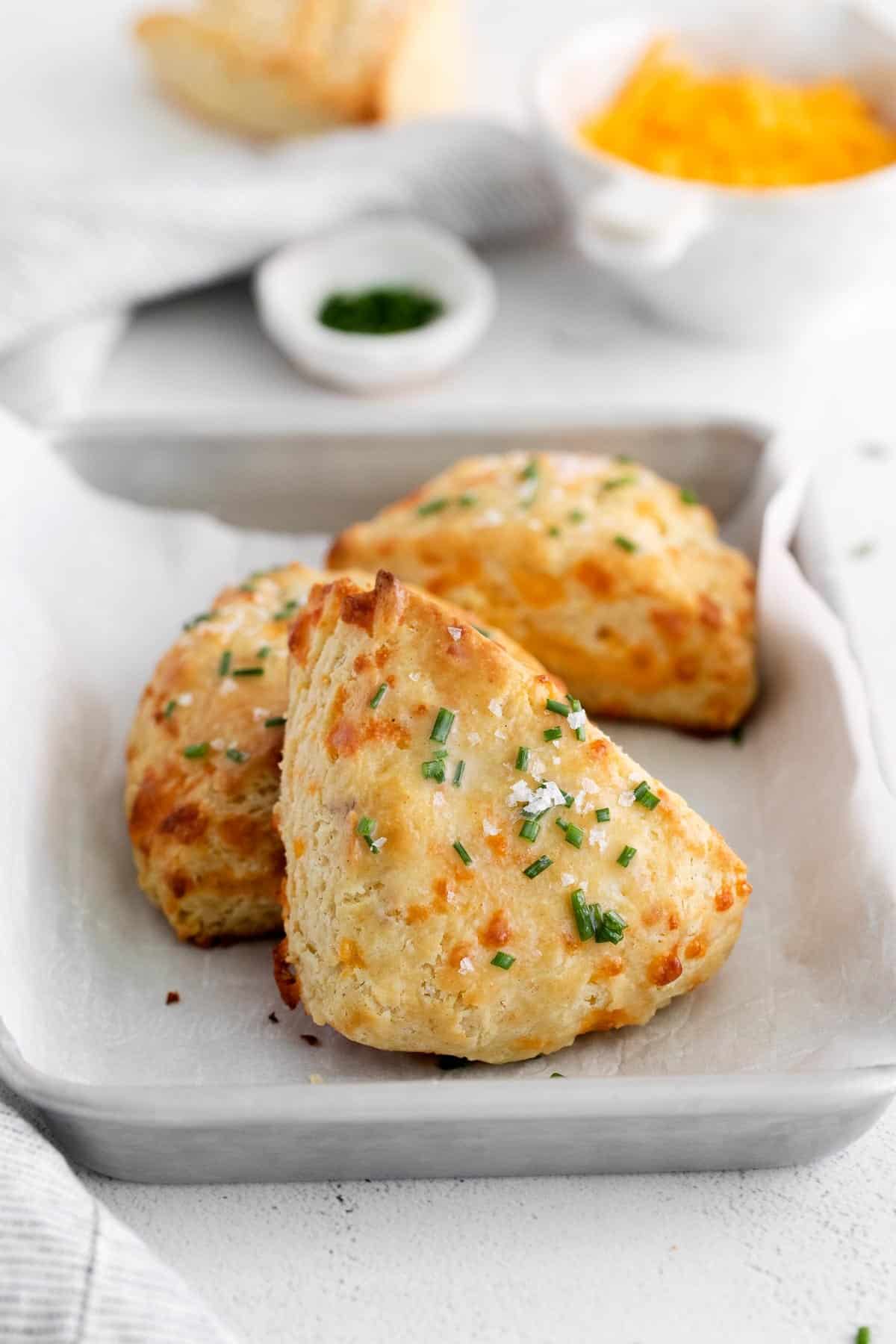 Cheese scones in a dish with parchment paper