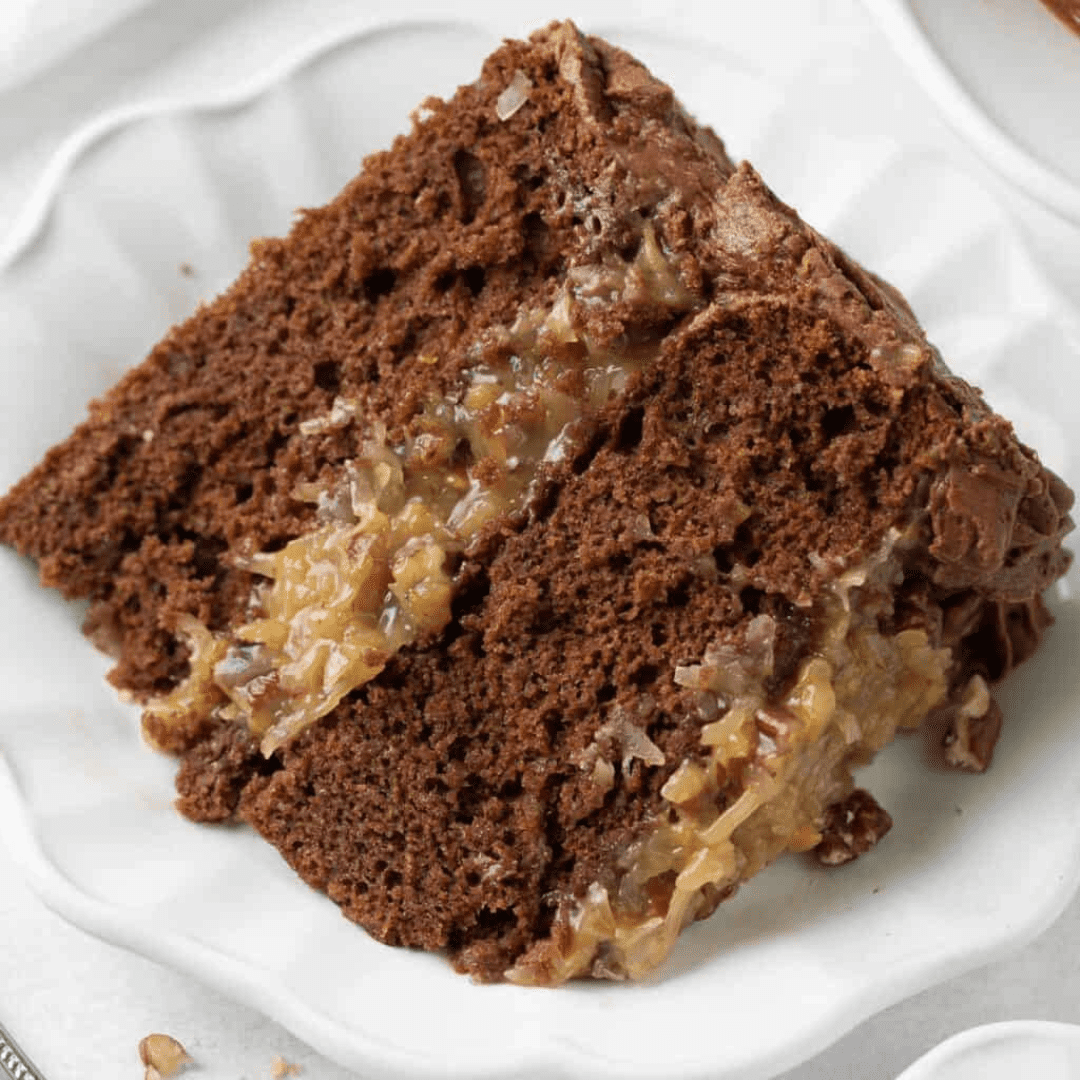 A slice of German chocolate cake on a plate