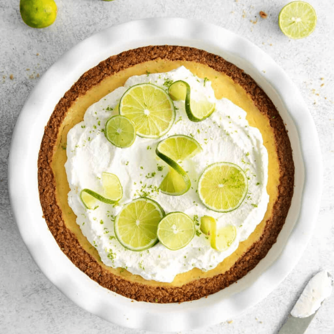 An overhead shot of key lime pie in a pie dish