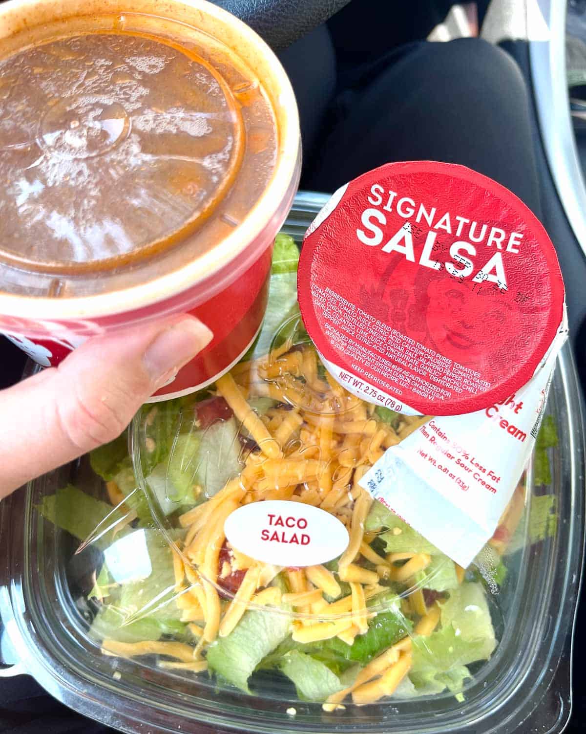 Wendy's salad in a plastic container