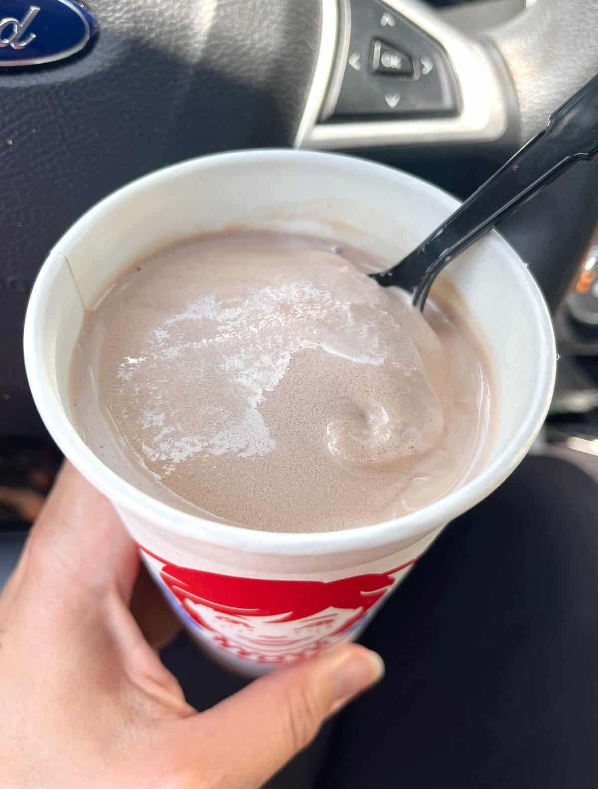 Wendy's Frosty with a spoon in it