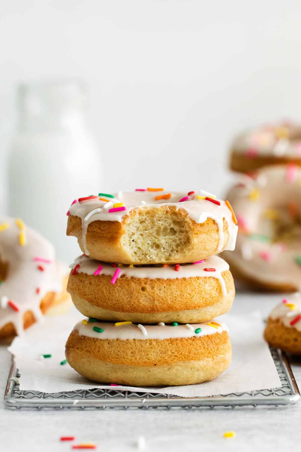 Gluten-free baked donuts stacked on top of each other