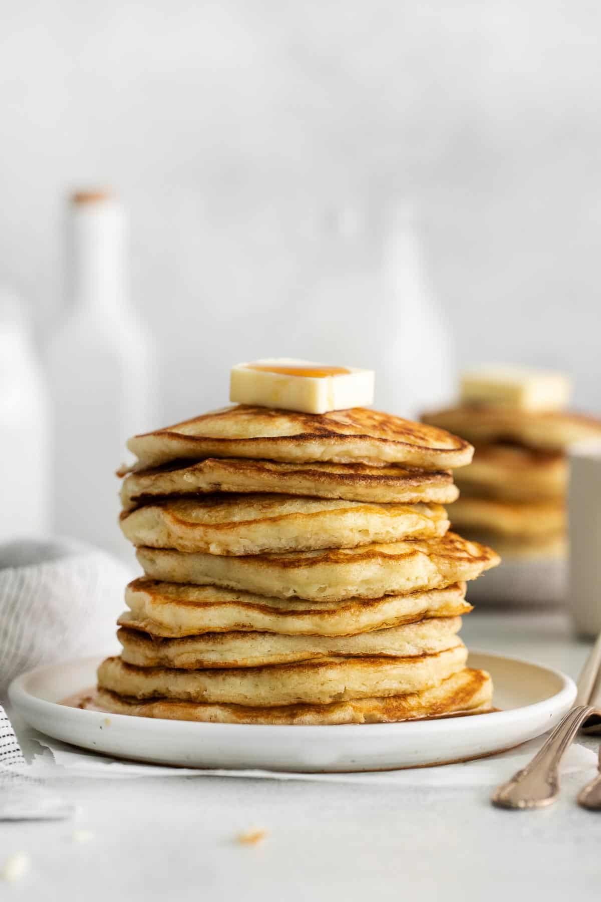 A stack of buttermilk pancakes on a plate