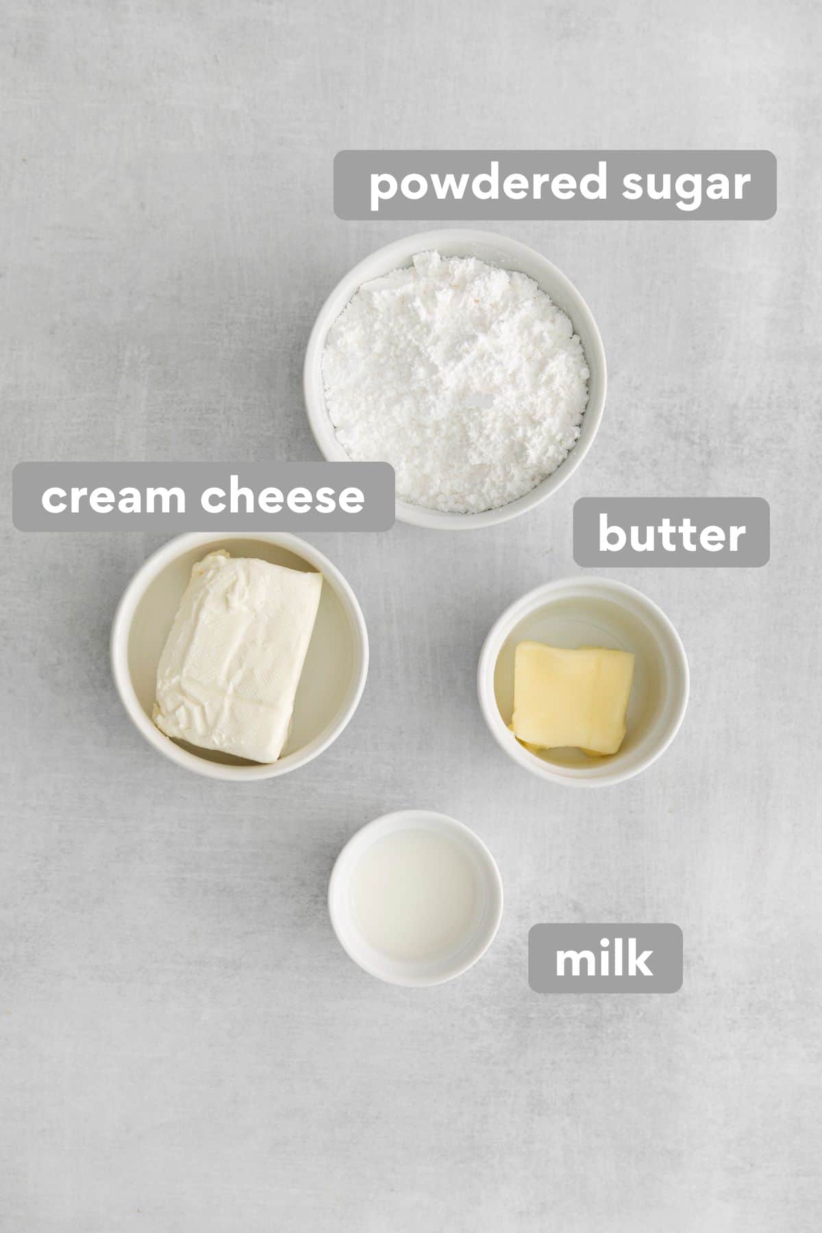 Ingredients for cream cheese glaze on a counter top