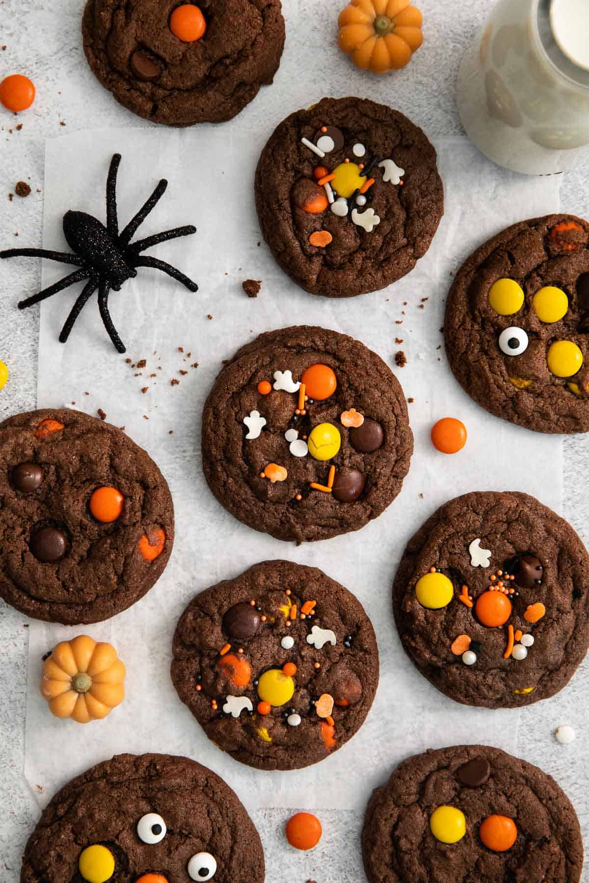 gluten free halloween cookies with sprinkles on white background with spider and sprinkles