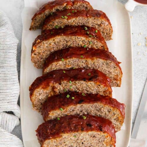 Gluten-free meatloaf sliced and arranged on a platter