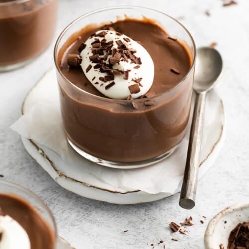 A side view of chocolate pudding in a ramekin