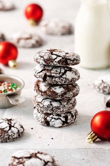 A stack of gluten-free chocolate crinkle cookies