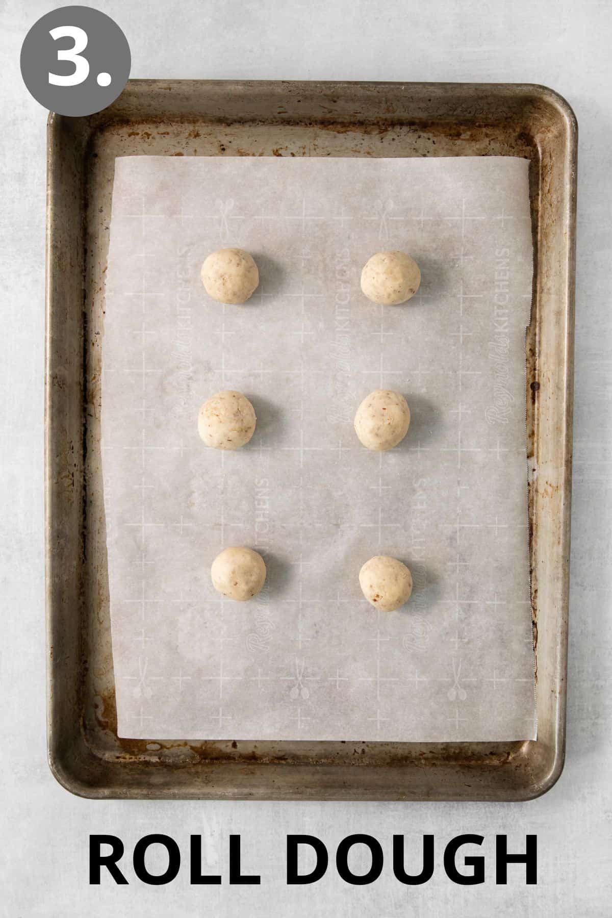 gluten-free snowball cookies dough on a baking sheet