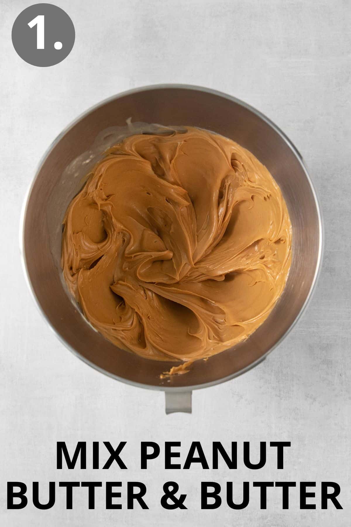 Peanut butter and butter mixed in the bowl of a standing mixer