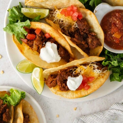 Gluten-free tacos with toppings on a plate